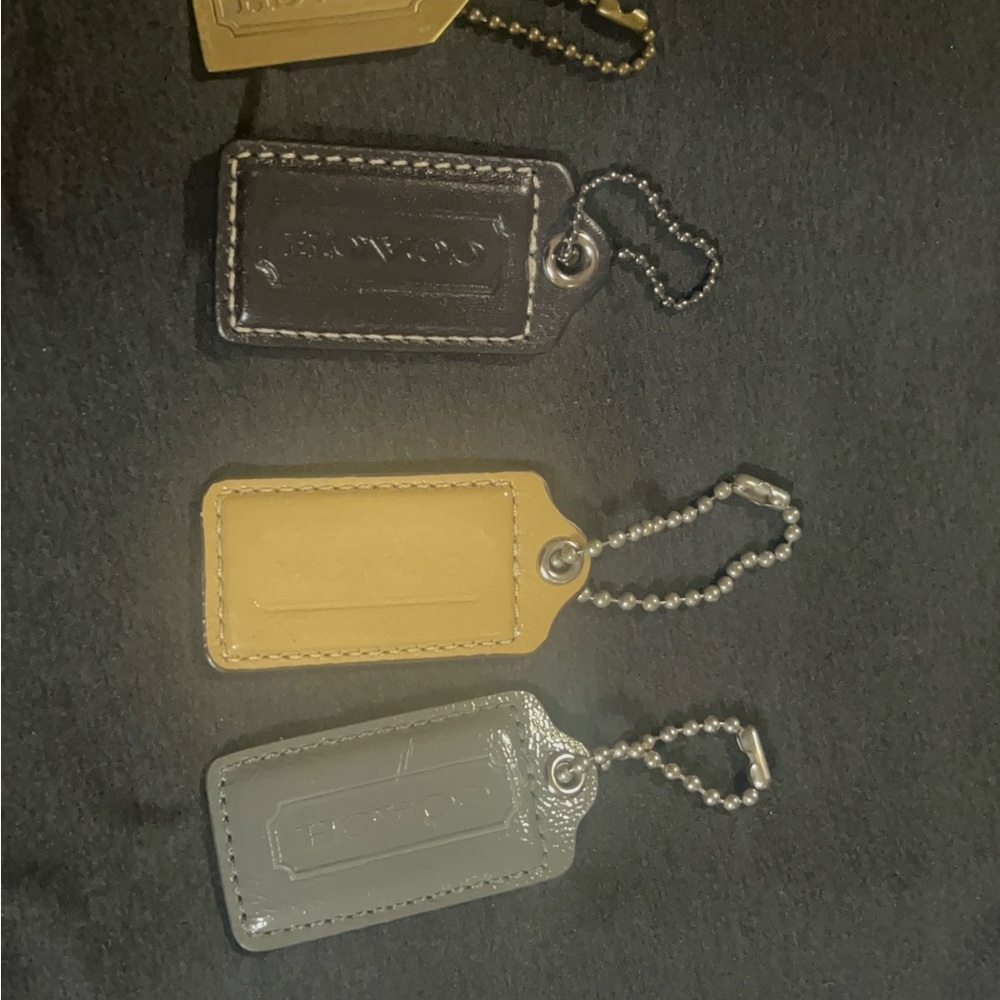 Coach Leather Key Tag Set in Black, Mustard, and Gray